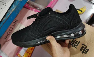 Men's black air cushion sneakers with artificial PU upper, plastic sole, and lace-up design for outdoor running