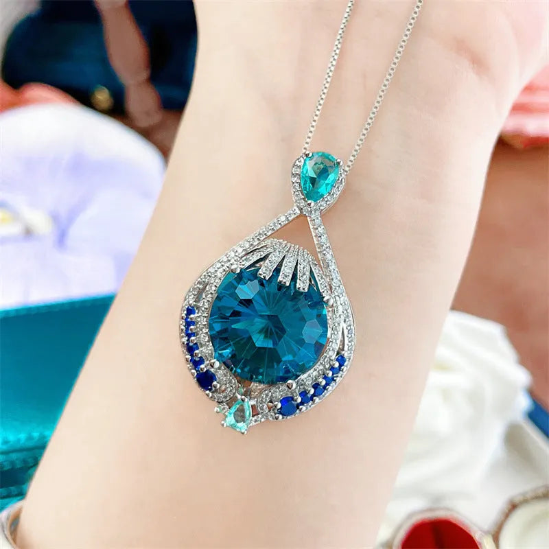 Geometric blue crystal pendant necklace on water wave chain for women