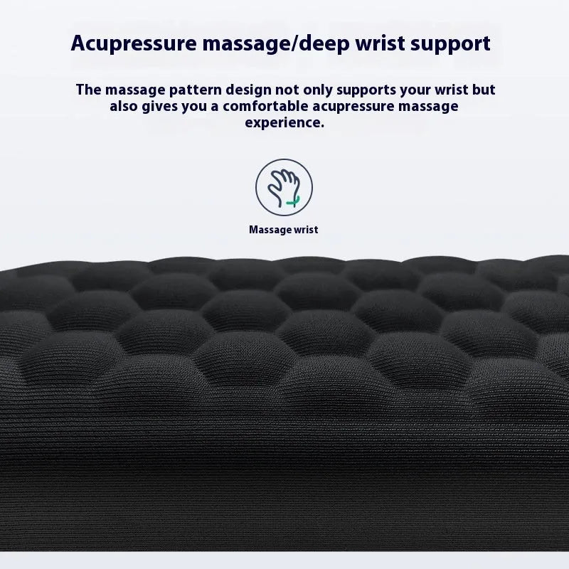 Customisable memory foam mouse wrist pad with black cloth cover on a desk.
