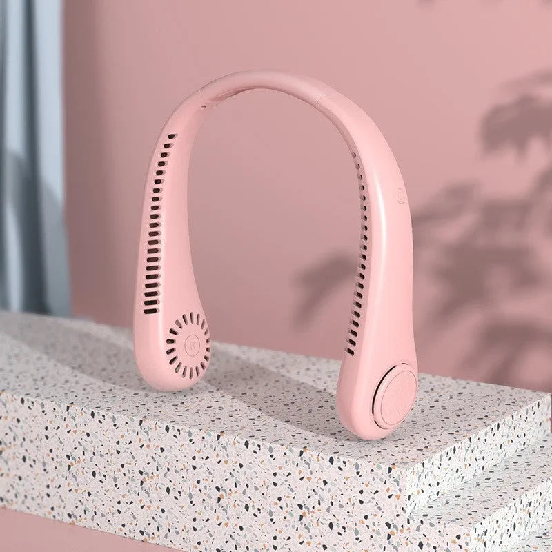 White portable bladeless neck fan with flexible neckband and USB charging port