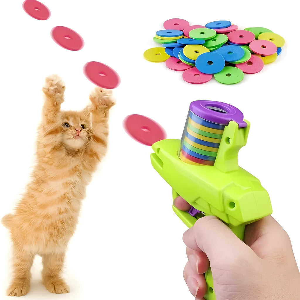 Green interactive cat toy launcher with three white foam discs on a carpet.