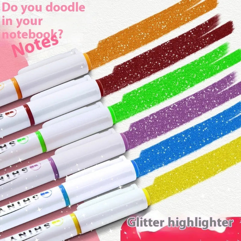Four glitter highlighter pens with pastel colours and slanted tips on a notebook.