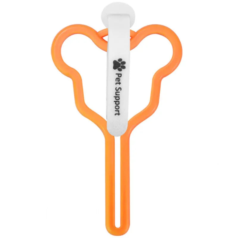 Hands-free dog poo bag holder with velcro strap attached to a dog lead.