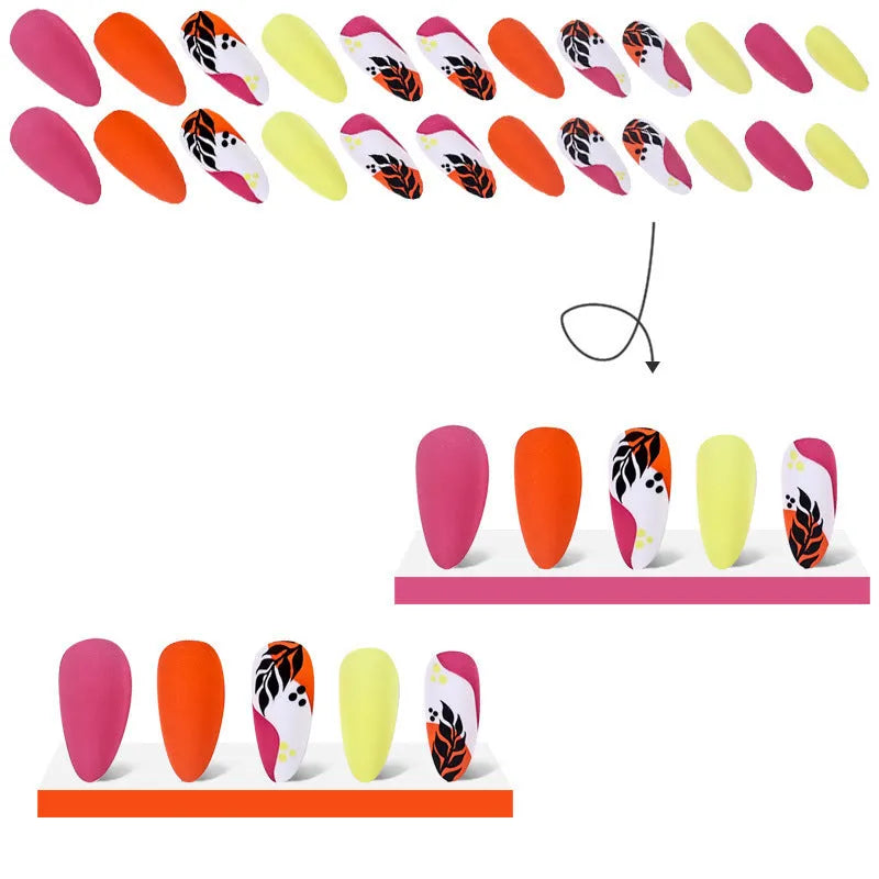 Four boxes of almond shaped nail stickers showing French colourful leaves, colourful plating, star flash macarons, and gradient leopard print designs