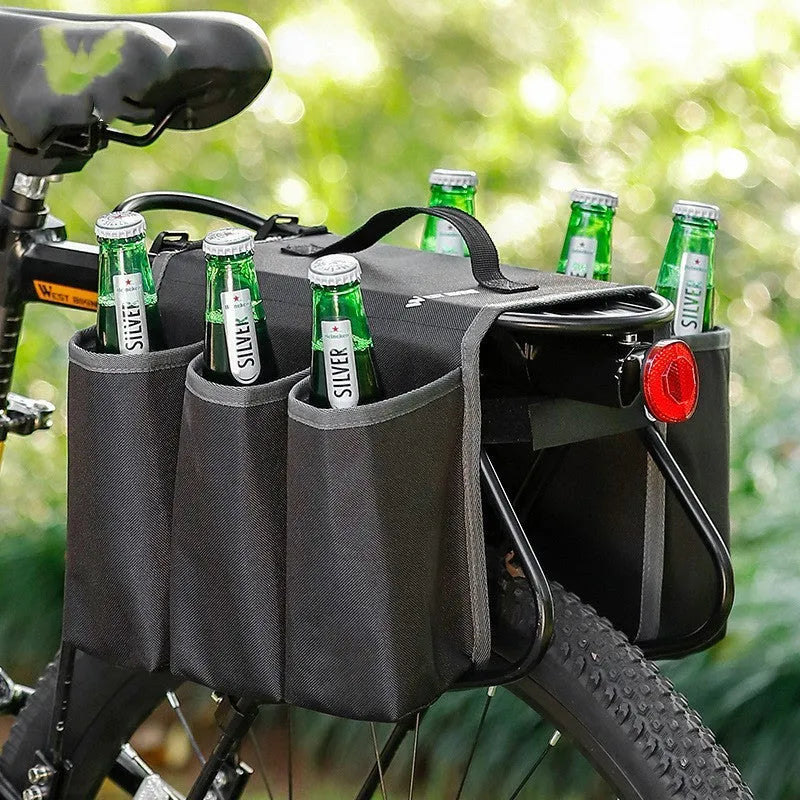 Black and orange double-sided bicycle drink holder bag made from 600D PVC fabric mounted on a bike frame.