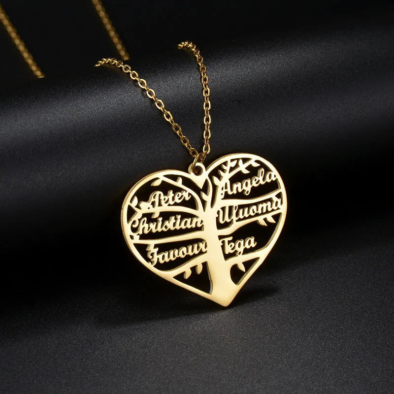 Personalised name necklace with hollow heart and tree pendant in silver, gold, or rose gold on a metal chain.