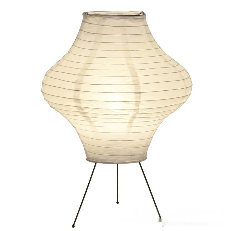 Japanese-style Xuan paper table lamp with a white shade on a wooden base.