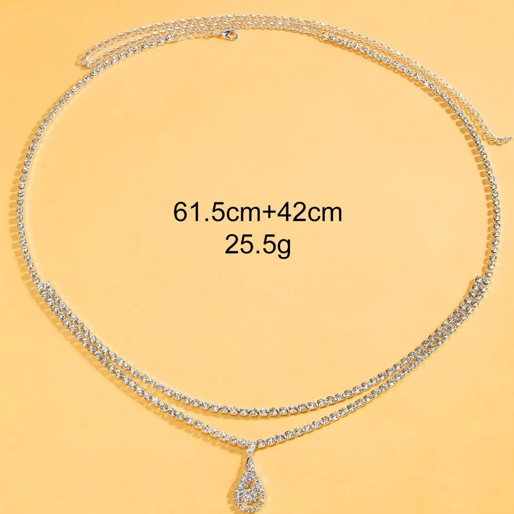 Gold waist chain with water drop rhinestone pendant and lobster buckle closure