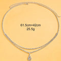 Gold waist chain with water drop rhinestone pendant and lobster buckle closure