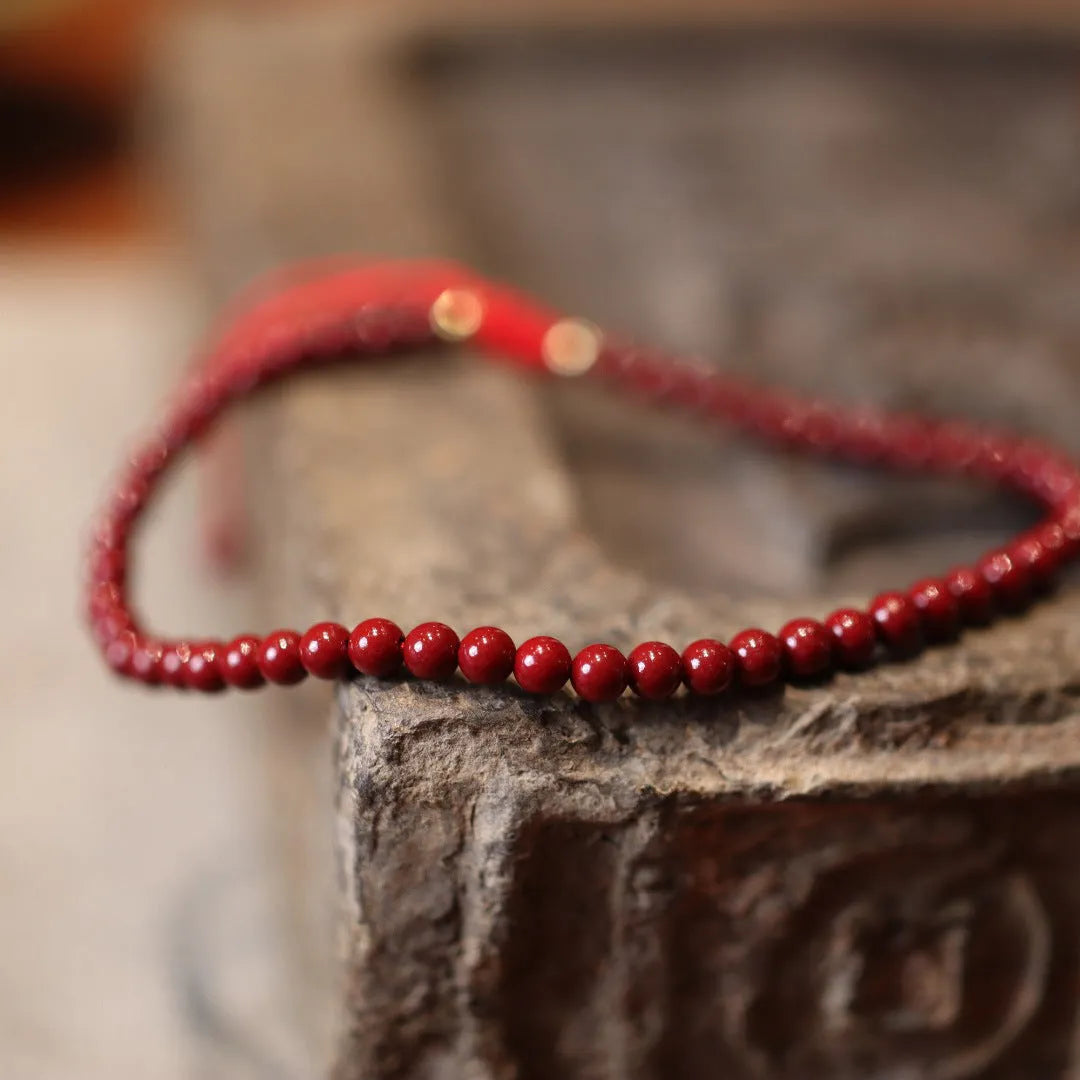Handmade natural cinnabar bracelet with purple gold sand geometric design, traditional Chinese style jewellery