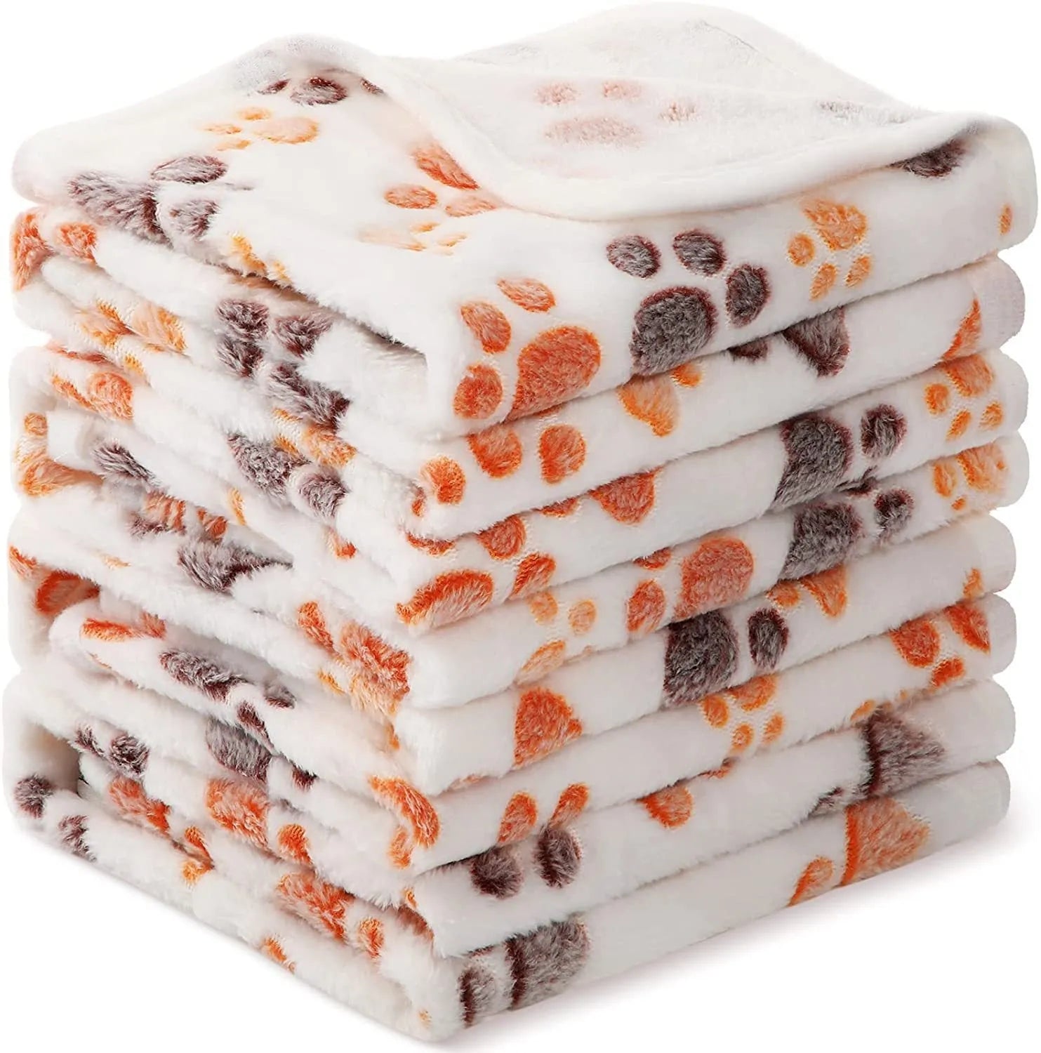 Soft coral fleece dog blanket with a paw print design, shown in a beige colour.