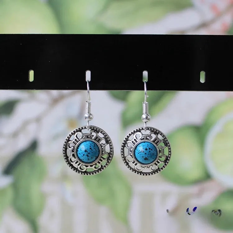 Handmade Miao silver retro turquoise flower disk earrings with geometric shape and ethnic patterns