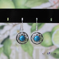 Handmade Miao silver retro turquoise flower disk earrings with geometric shape and ethnic patterns