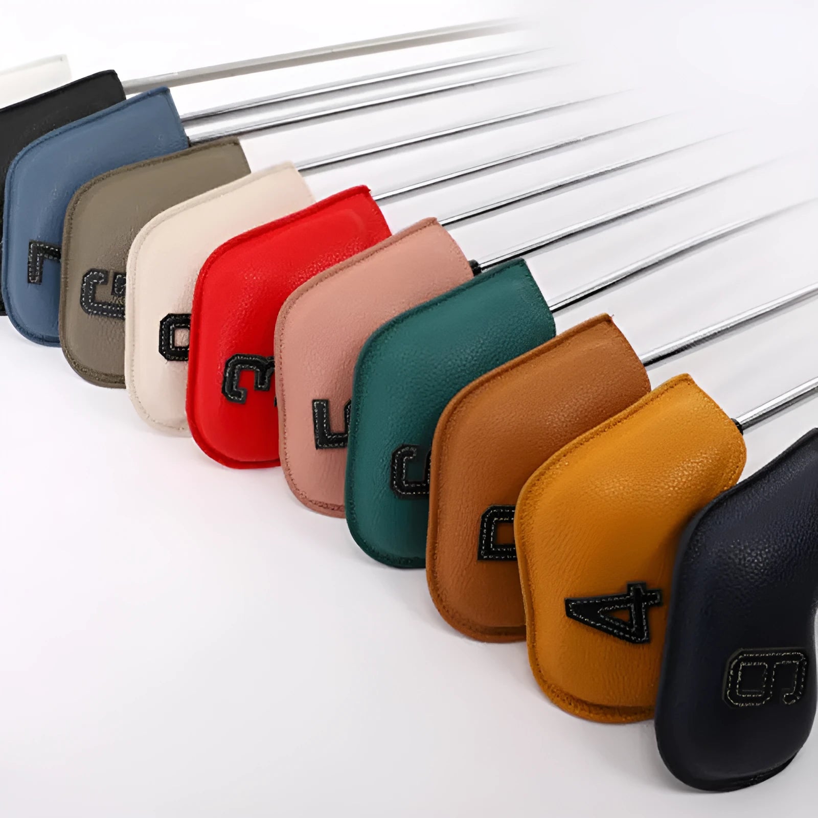 Set of 10 minimal print golf club head caps in multiple colours made from PU material