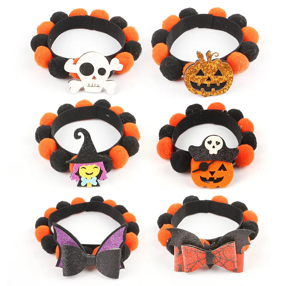 Halloween pet collar with a furry ball accessory in a pumpkin design on a dog's neck.