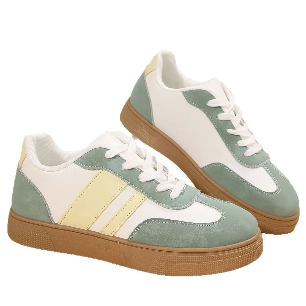 Green retro sports women's shoes with cross-strap design and low-top construction
