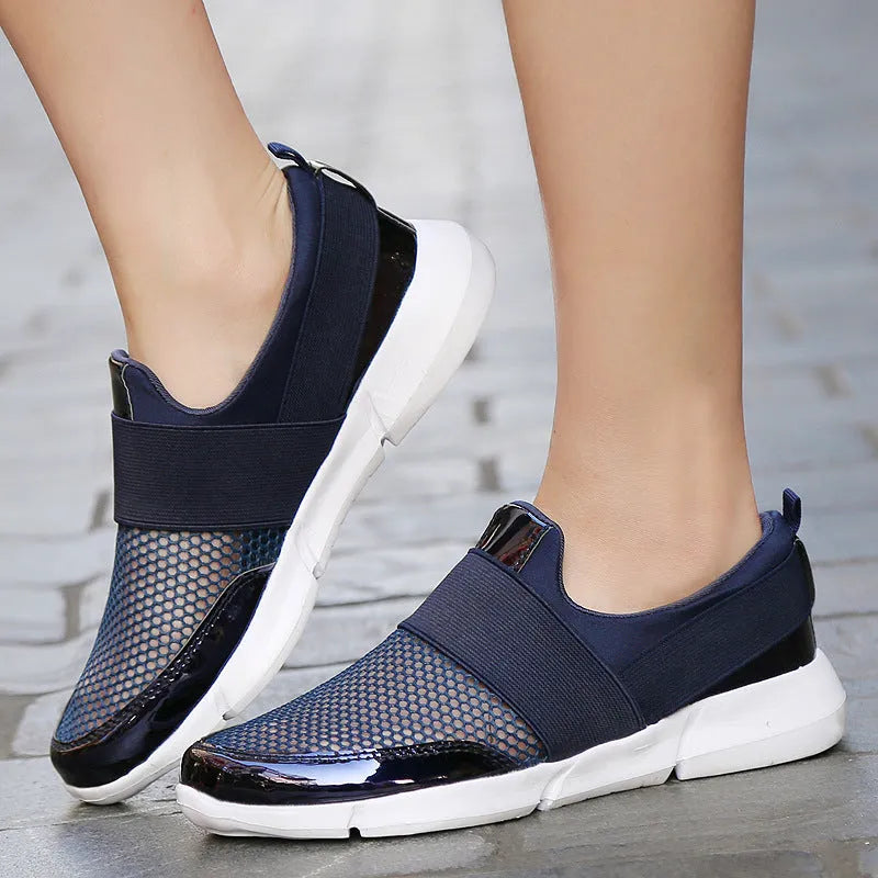Women's low-top casual sneakers in blue with mesh lining and lightweight construction