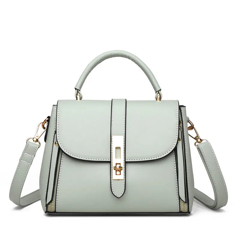 Soft PU leather women's messenger bag in a square vertical shape with an adjustable shoulder strap.