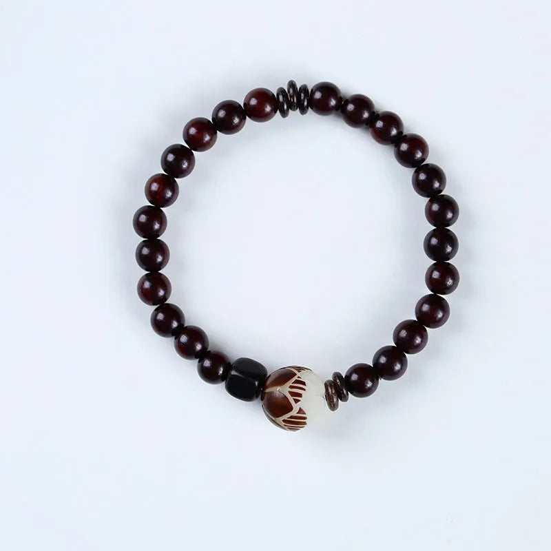 Natural rosewood double-ring bracelet with retro flower design, 10mm size, showing double circle pattern