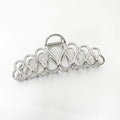 Large minimalist updo hair clip in gold or silver electroplated alloy with tassel details