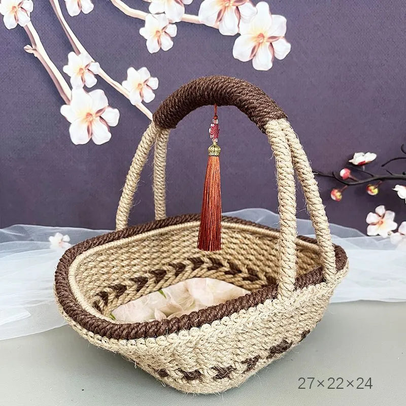 Hand-woven straw basket with hemp rope detailing in rustic style