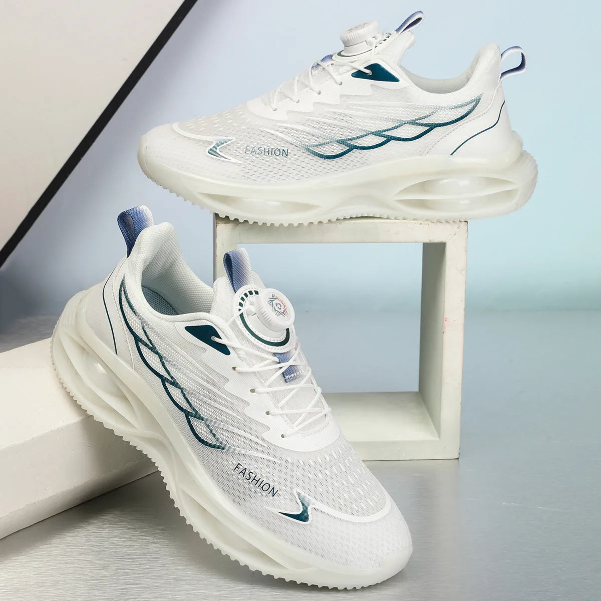 Casual running shoes with mesh upper in sky blue, black gold, or white with rubber soles and front lace-up closure