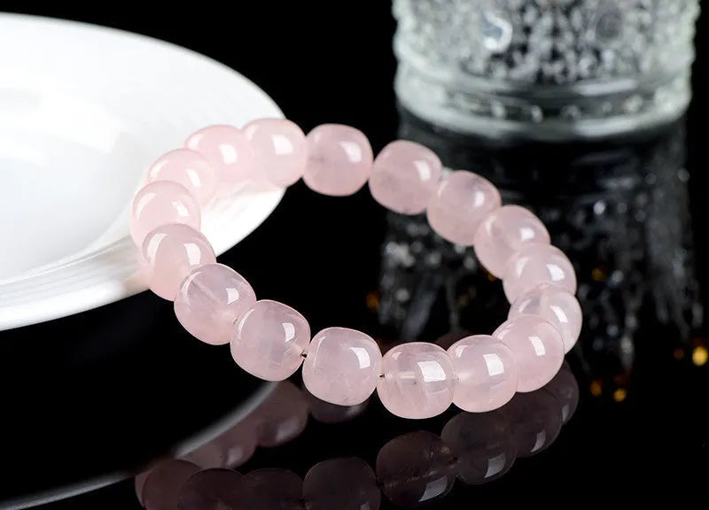 Pink bracelet with geometric barrel beads made from natural bamboo crystal measuring 11 * 12mm