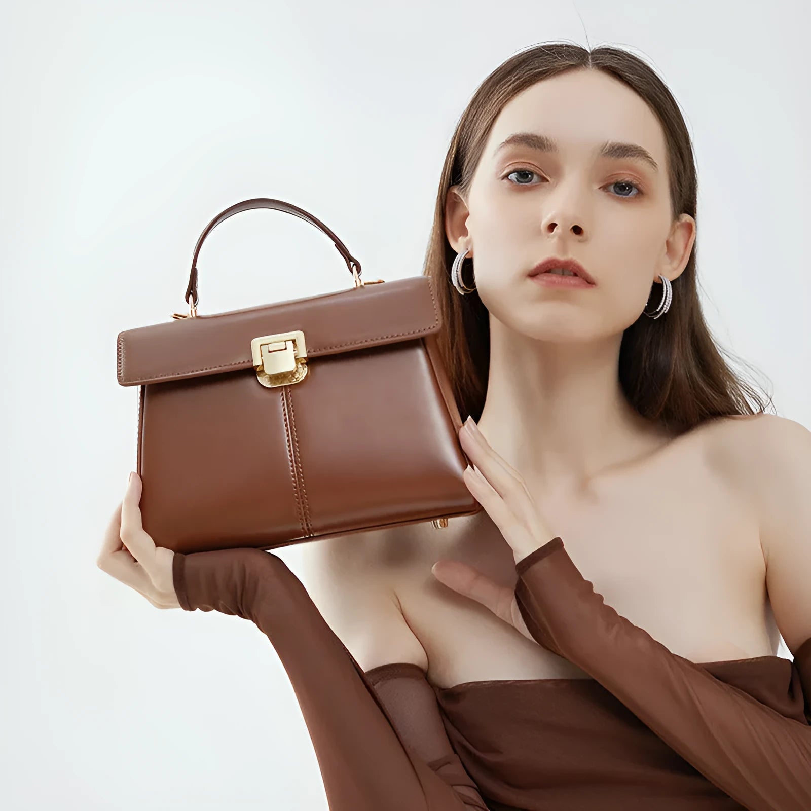 Women's genuine leather shoulder bag with vachette clasp in black horizontal square design