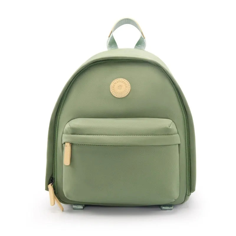 Women's polyester shoulder camera bag in black with a curved strap and detachable iPad pocket.