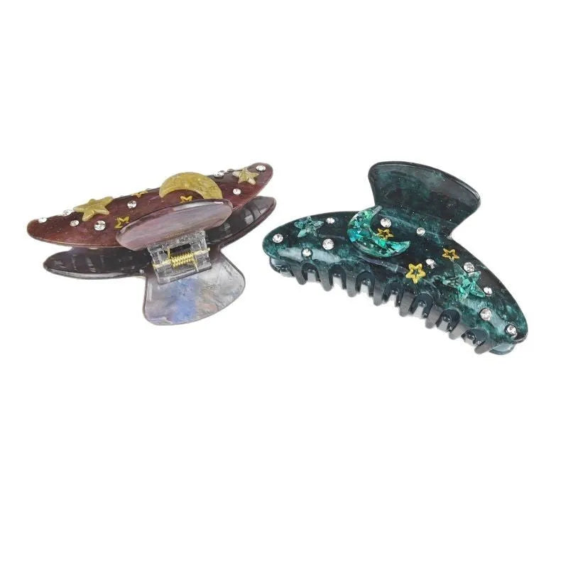 Oversized women's barrette hair clip with a starry sky pattern in sky blue.