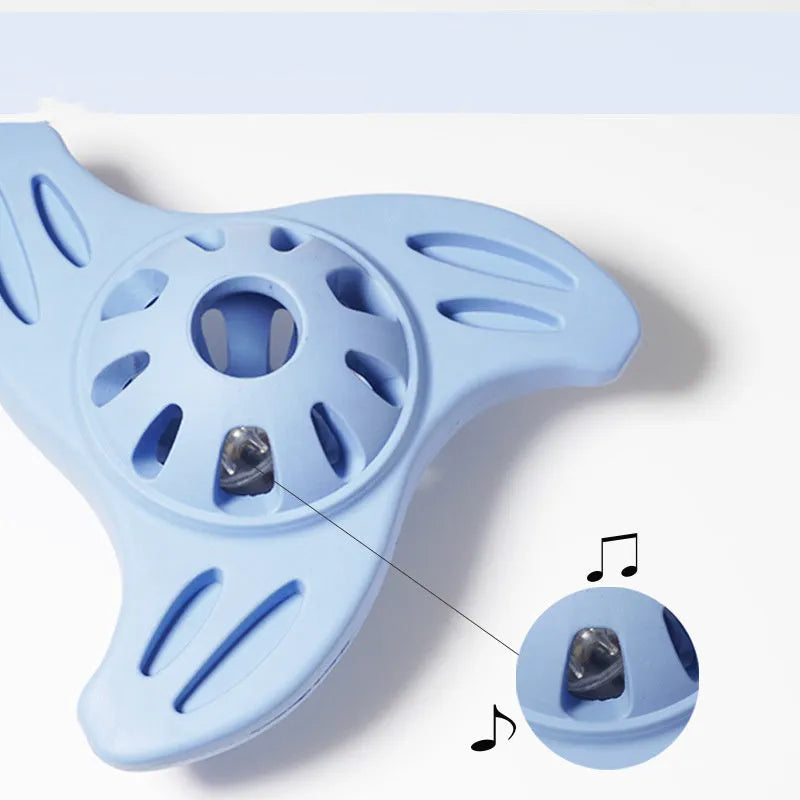 Blue boomerang shaped dog toy with molar texture for medium to large breed puppies