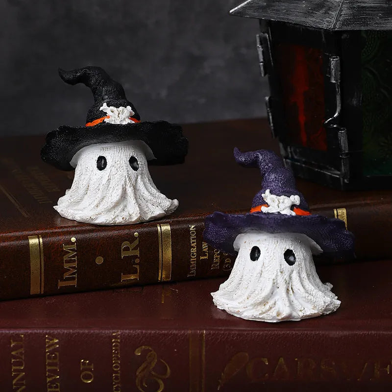 Resin wizard hat holiday ornament in purple or black, 7cm tall.