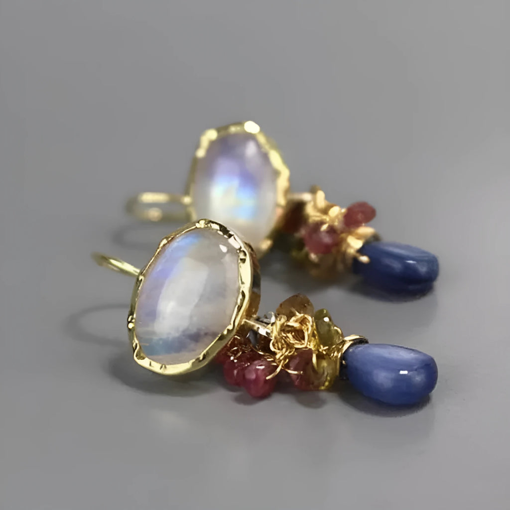 Retro vertical earrings with colored stones in geometric copper design, micro-set style