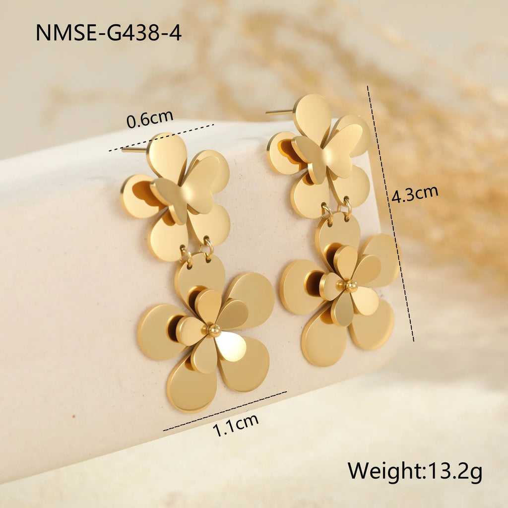Gold flower butterfly stainless steel earrings with 18K electroplated finish and floral design elements