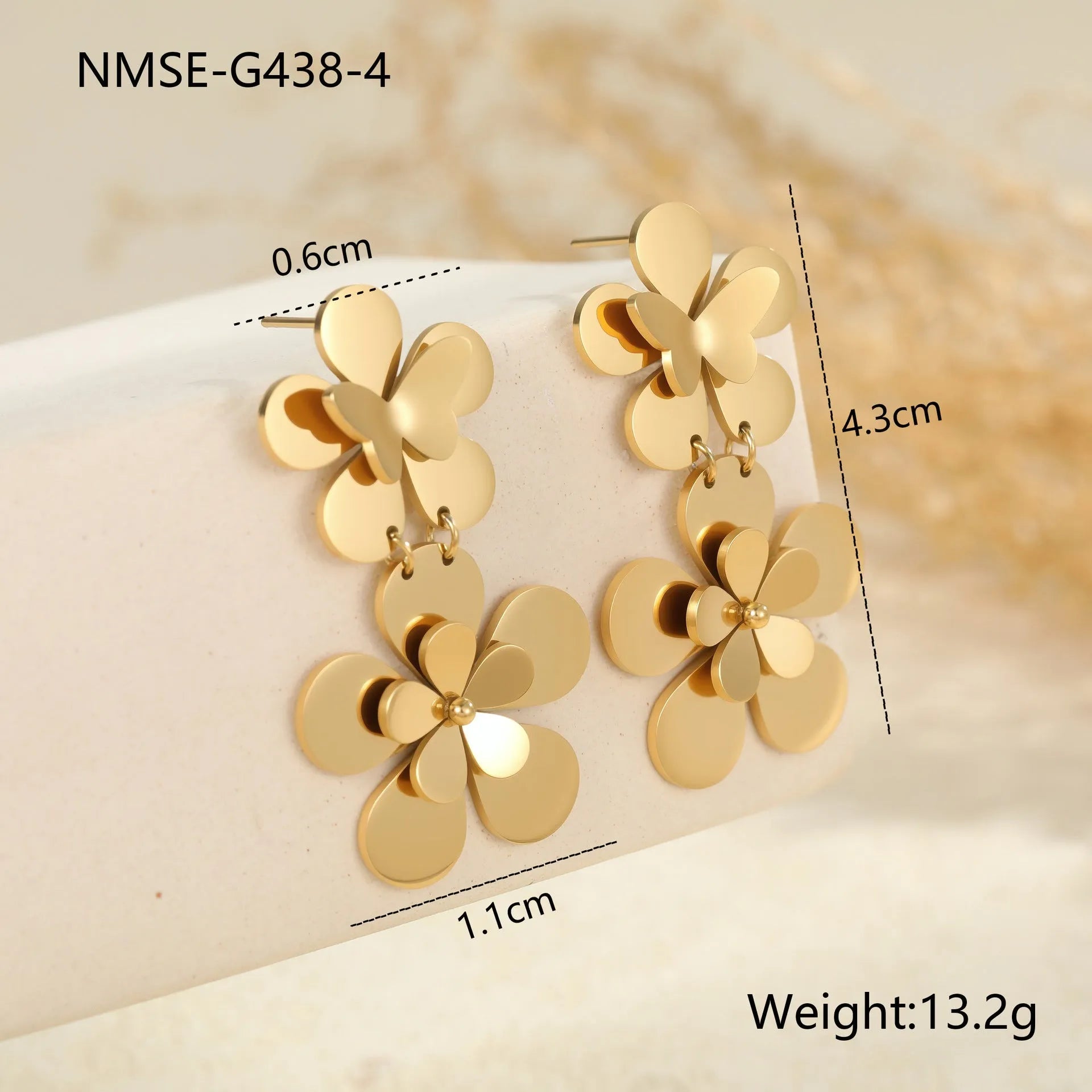 Gold flower butterfly stainless steel earrings with 18K electroplated finish and floral design elements