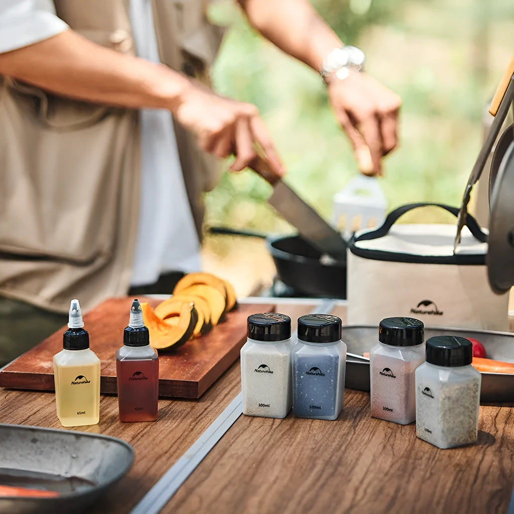 Naturehike outdoor seasoning bottle set showing six white PP containers with modern simple design