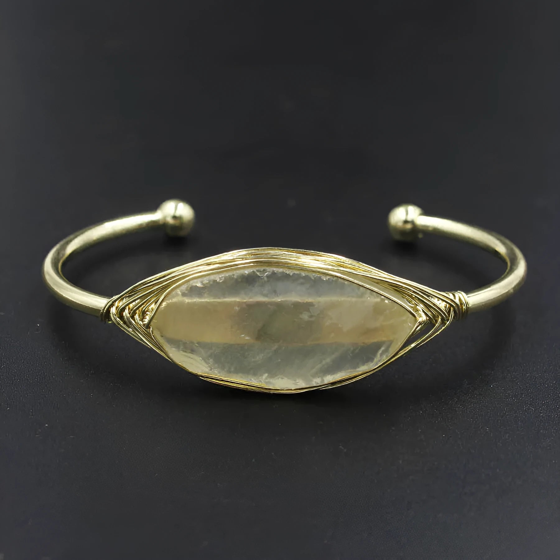 Natural raw gemstone bracelet with winding crystal design showing 8mm stones in various colours