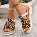 Leopard print wedge platform sandals with a fish mouth toe in light green.