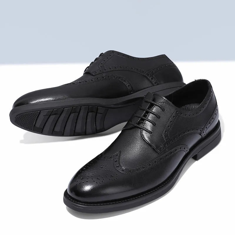 Men's black and brown brogue shoes with traditional wingtip detailing for business wear