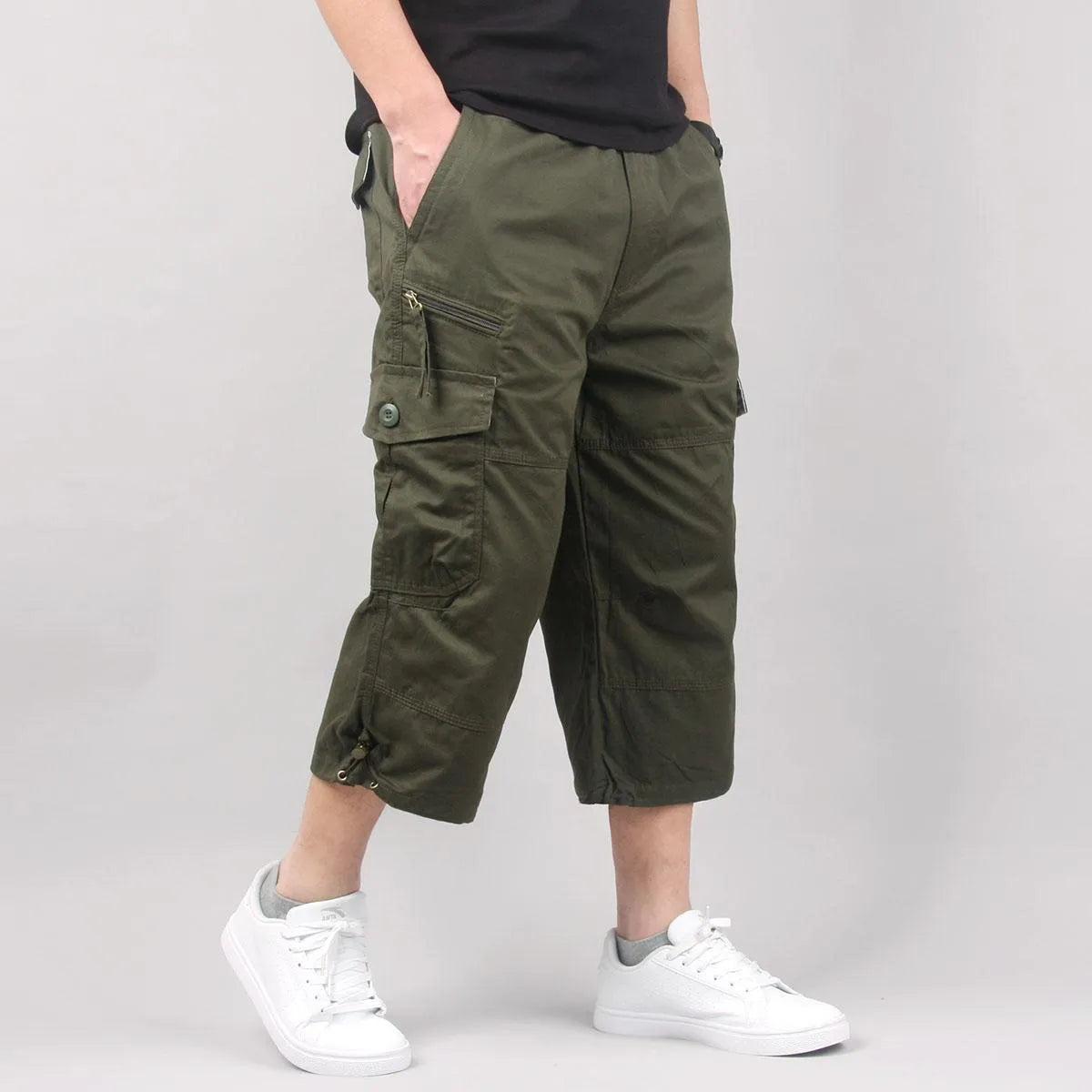 Men's loose-fit cotton cropped casual pants in army green colour on a white background