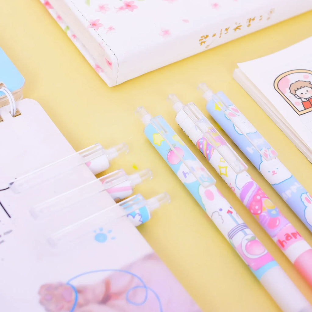 Six black plastic pens with cartoon bunny design and 0.5mm fine tips in an open box.