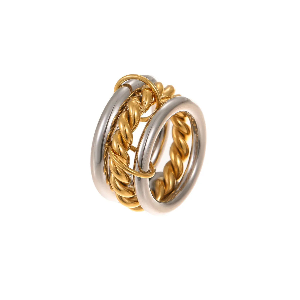 Stacked colour matching stainless steel ring set with 18K gold plating and exaggerated profile