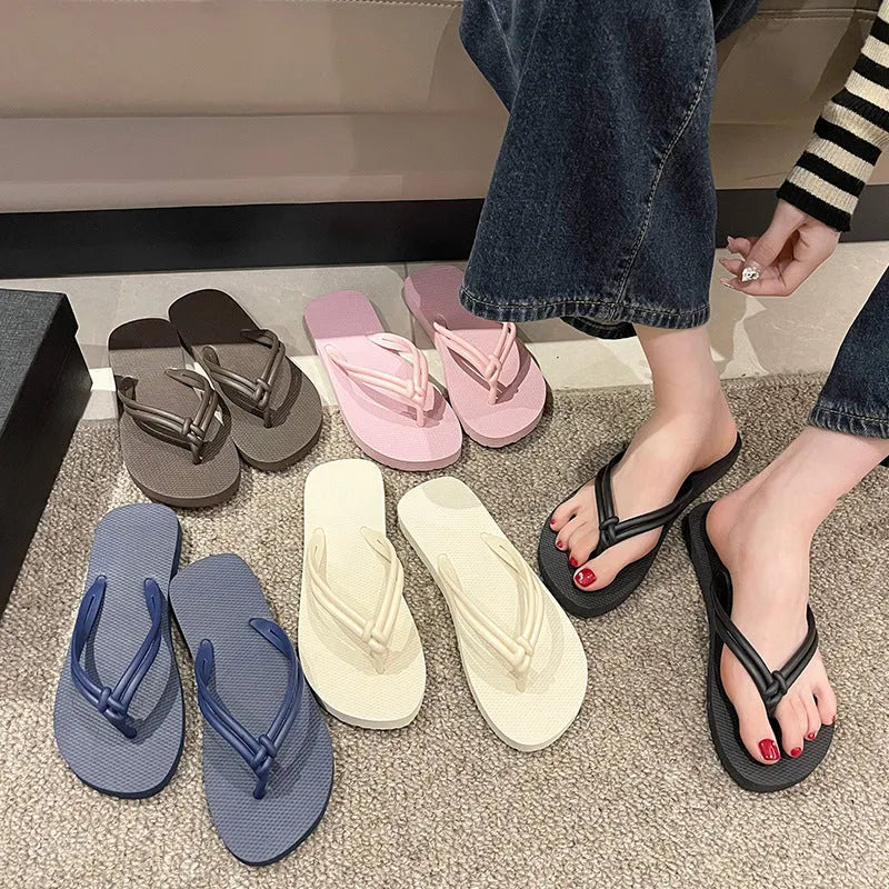 Men's closed-toe PVC flip flops in multiple colours on a plain background.