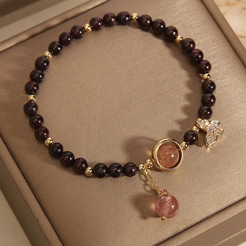 Black stone micro inlay butterfly pendant bracelet on wrist