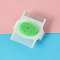 Blue pet grooming comb with floating hair removal feature for dogs and cats