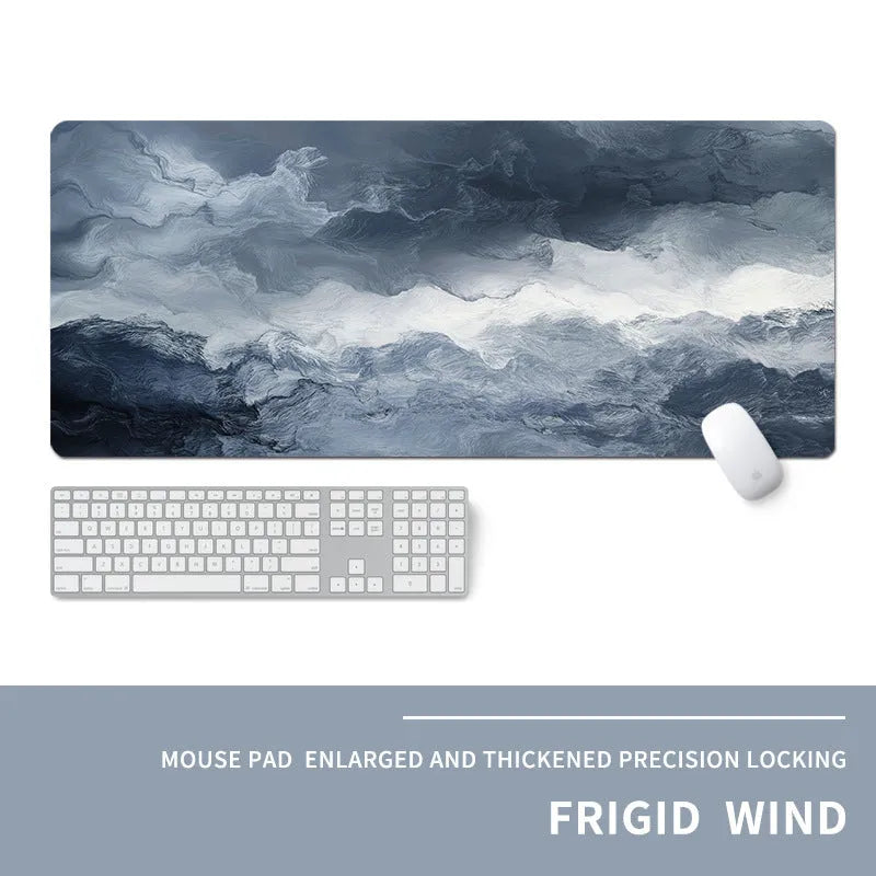 Oversized thick gaming mouse pad with printed e-sports design on a desk with keyboard and mouse.