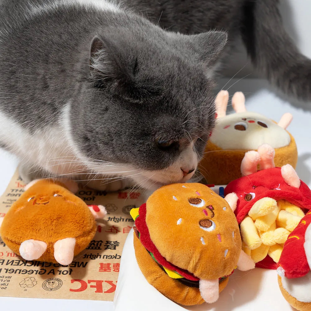 Set of five plush cat chew toys shaped like a hamburger, chicken leg, fries, bread, and hot dog.