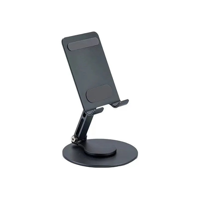 Aluminum alloy rotating mobile phone bracket in grey with silicone grip on desk showing phone in portrait mode
