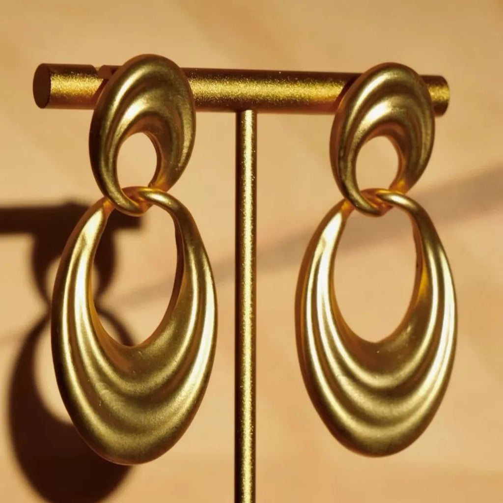 Quicksand gold coloured double circle French retro drop earrings with a U-shaped silhouette.