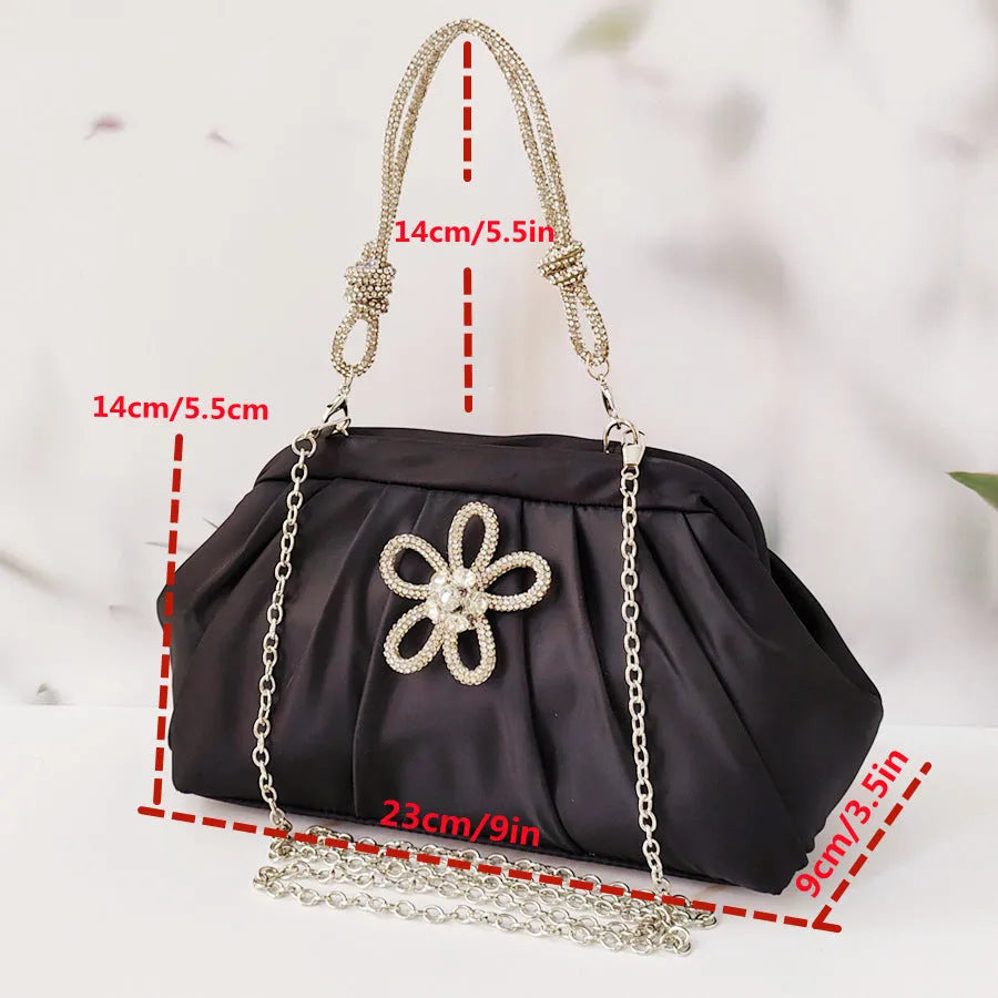Soft shell-shaped women's large-capacity messenger bag in black, lavender purple, or rose red with fold and chain details.